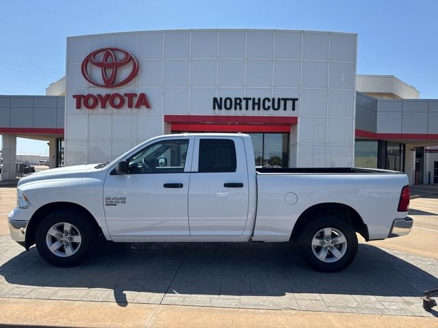 2024 RAM 1500 Classic SLT in Bright White Clea — front three-quarter view