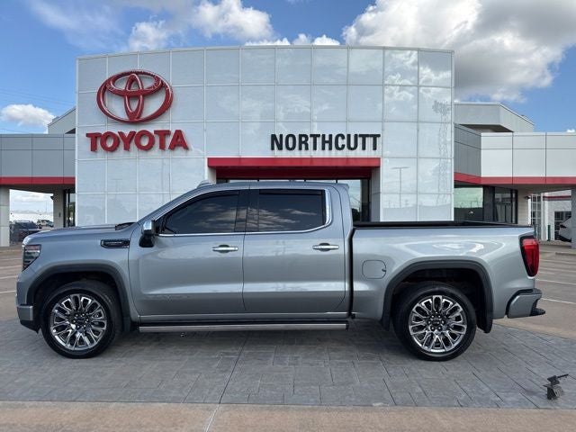 2024 GMC Sierra 1500 Denali Ultimate in Sterling Metallic — front three-quarter view