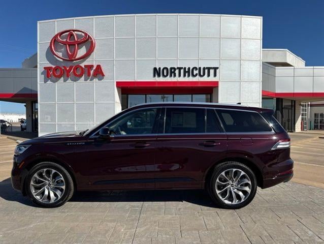 2023 Lincoln Aviator Grand Touring in Diamond Red Met T — front three-quarter view